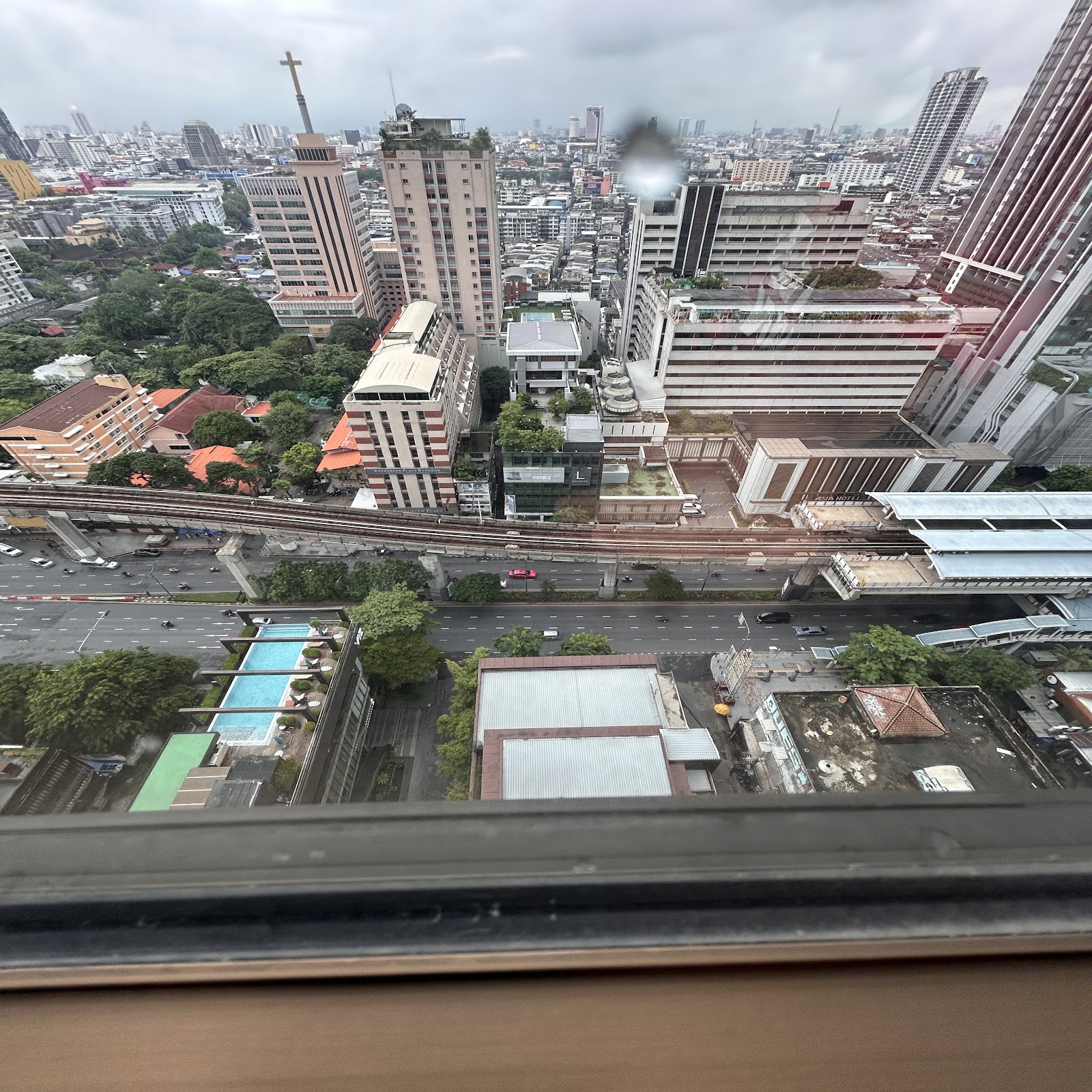Bangkok skyline at dawn from a high hotel floor